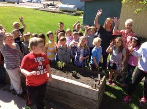 1st & 2nd graders planted at the Care Center. Photo courtesy of Carmen Rath-Wald, North Dakota State University Extension Service