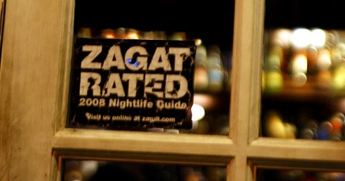 Door with "Zagat Rated" sticker.