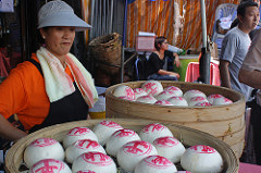 Basket of good luck buns. Photo istolethetv on Flickr