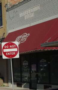 Empty building with a "DO NOT ENTER" sign