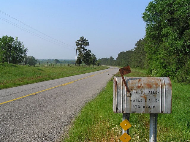 Mailbox on a country road with a rural route address