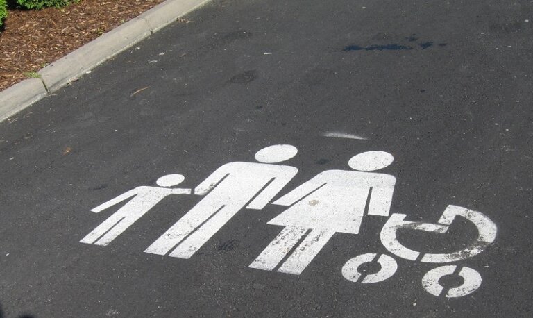 Want more young families to shop downtown? Consider family parking