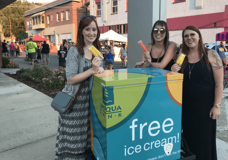 Haley, Jamie and Karlie hand out ice cream from their mobile ice cream cooler
