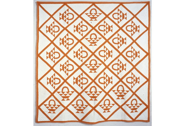 Quilt with repeating basket design