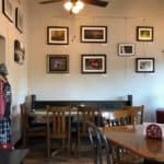 Coffee shop with local art displayed on the walls