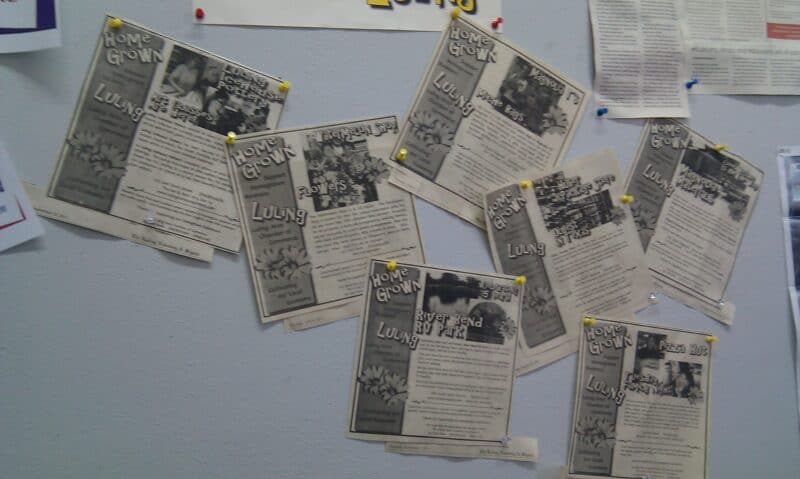 Local business profiles appear in newspaper clippings